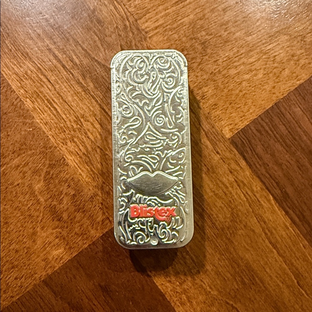 VINTAGE NEVER USED BLISTEX ANNIVERSARY TIN "60 YEARS OF SMILES!" - SO CUTE!